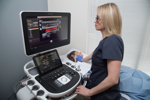 One of Access MRI’s technologists performs a diagnostic ultrasound on a patient’s neck. Our Surrey ultrasound clinic provides a full spectrum of ultrasound services with minimal wait times.